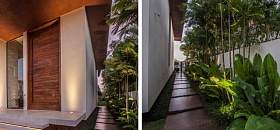  Esta casa ganhou uma entrada lateral envolta por vegetação, permitindo que os visitantes acessem o jardim sem precisar passar pelas demais áreas da residência | Projeto de paisagismo: Depieri Paisagismo | Projeto de arquitetura: Denise Zuba Arquitetos | Fotos: Clausem Bonifacio