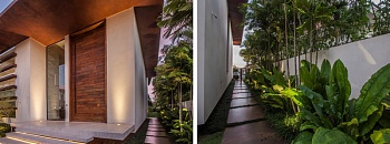  Esta casa ganhou uma entrada lateral envolta por vegetação, permitindo que os visitantes acessem o jardim sem precisar passar pelas demais áreas da residência | Projeto de paisagismo: Depieri Paisagismo | Projeto de arquitetura: Denise Zuba Arquitetos | Fotos: Clausem Bonifacio