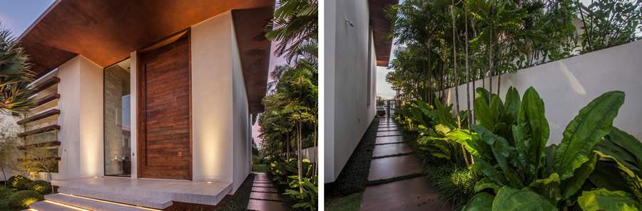  Esta casa ganhou uma entrada lateral envolta por vegeta&ccedil;&atilde;o, permitindo que os visitantes acessem o jardim sem precisar passar pelas demais &aacute;reas da resid&ecirc;ncia | Projeto de paisagismo: Depieri Paisagismo | Projeto de arquitetura: Denise Zuba Arquitetos | Fotos: Clausem Bonifacio