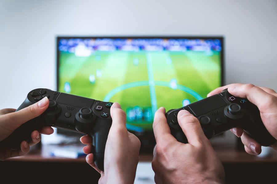 Photo by JESHOOTS.com: https://www.pexels.com/photo/two-people-holding-black-gaming-consoles-442576/