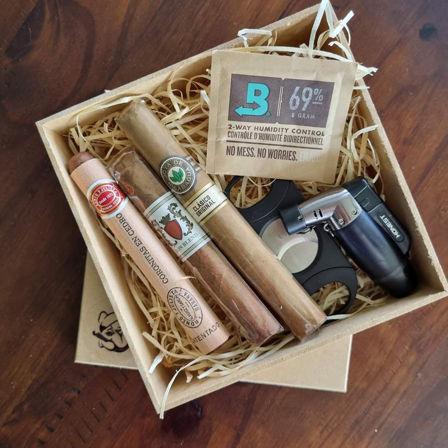 Tr&ecirc;s charutos de fortaleza suave, al&eacute;m dos acess&oacute;rios b&aacute;sicos para iniciar - Bulldog Tabacaria