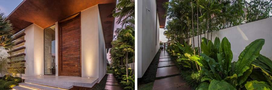  Esta casa ganhou uma entrada lateral envolta por vegeta&ccedil;&atilde;o, permitindo que os visitantes acessem o jardim sem precisar passar pelas demais &aacute;reas da resid&ecirc;ncia | Projeto de paisagismo: Depieri Paisagismo | Projeto de arquitetura: Denise Zuba Arquitetos | Fotos: Clausem Bonifacio