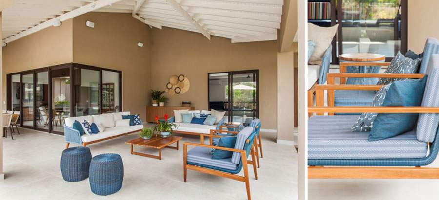 Azul com tons terrosos: composi&ccedil;&atilde;o aconchegante conduz ao relaxamento e descanso nas poltronas e nos sof&aacute;s dessa varanda de estar coberta. Ideal para descontrair, seja lendo um livro ou curtindo um momento em fam&iacute;lia | Projeto: Korman Arquitetos | Fotos: Eduardo Pozella